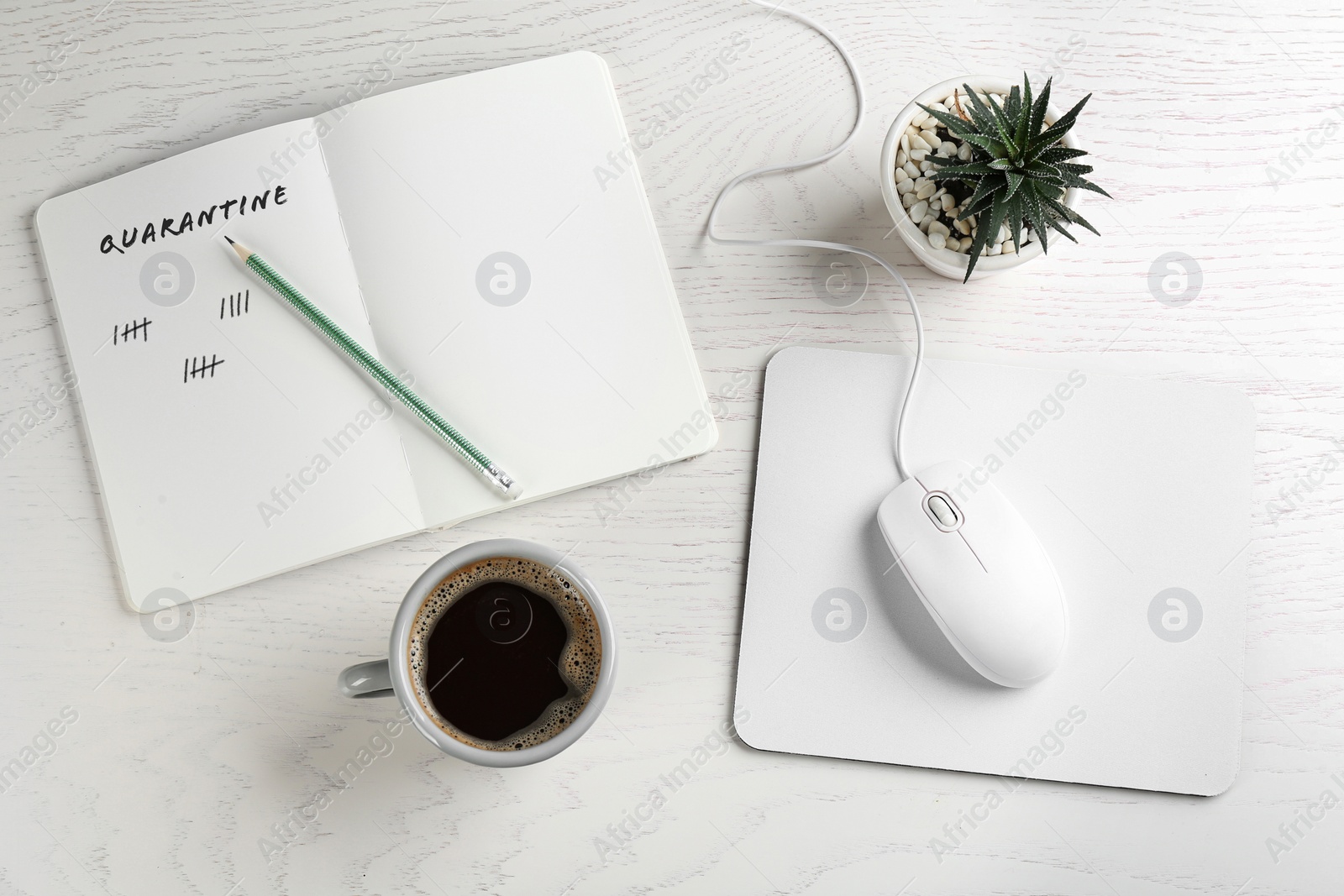 Image of Flat lay composition with mouse and cup of coffee on white wooden table. Counting days of quarantine during coronavirus outbreak