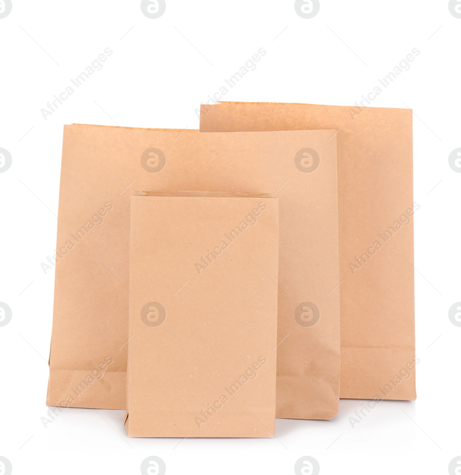 Photo of Paper bags isolated on white. Mockup for design