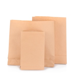 Photo of Paper bags isolated on white. Mockup for design