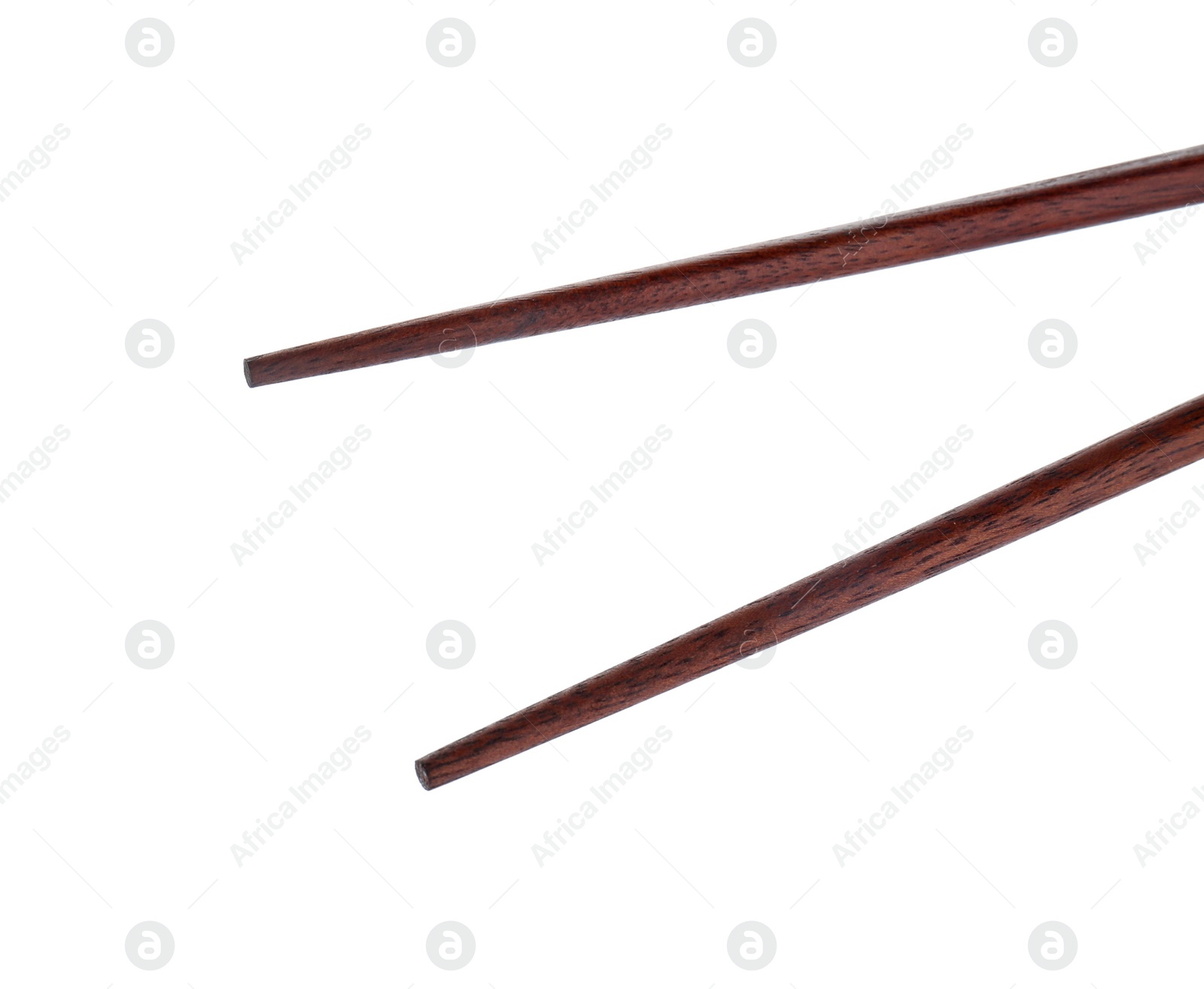 Photo of Pair of wooden chopsticks isolated on white