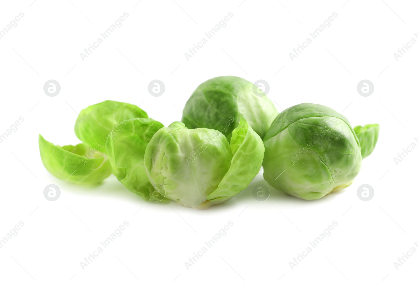 Photo of Tasty fresh Brussels sprouts isolated on white