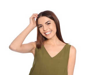 Photo of Portrait of young woman laughing on white background