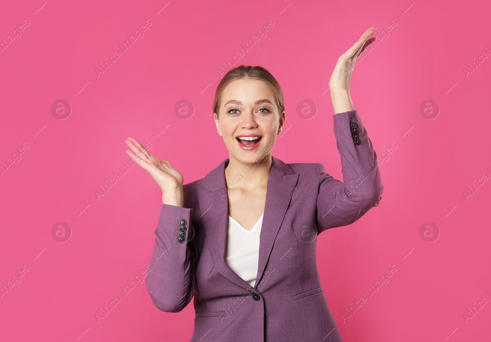 Photo of Portrait of emotional young businesswoman on color background