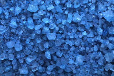 Photo of Blue sea salt as background, top view