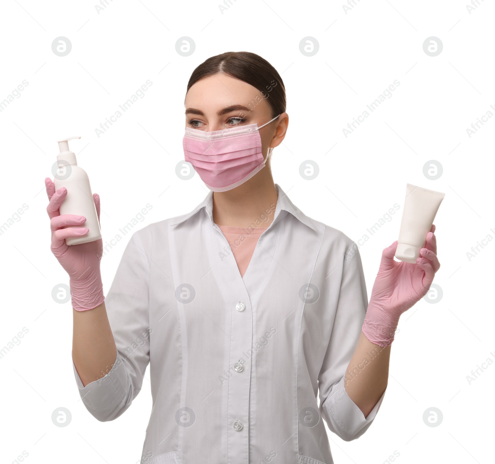 Photo of Cosmetologist with cosmetic products on white background