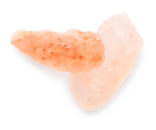 Photo of Crystals of pink himalayan salt isolated on white, top view