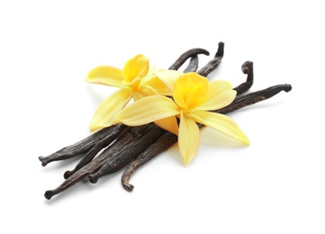 Photo of Aromatic vanilla sticks and flowers on white background