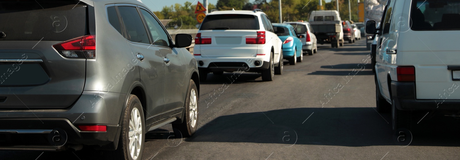 Image of Cars in traffic jam on city street. Banner design