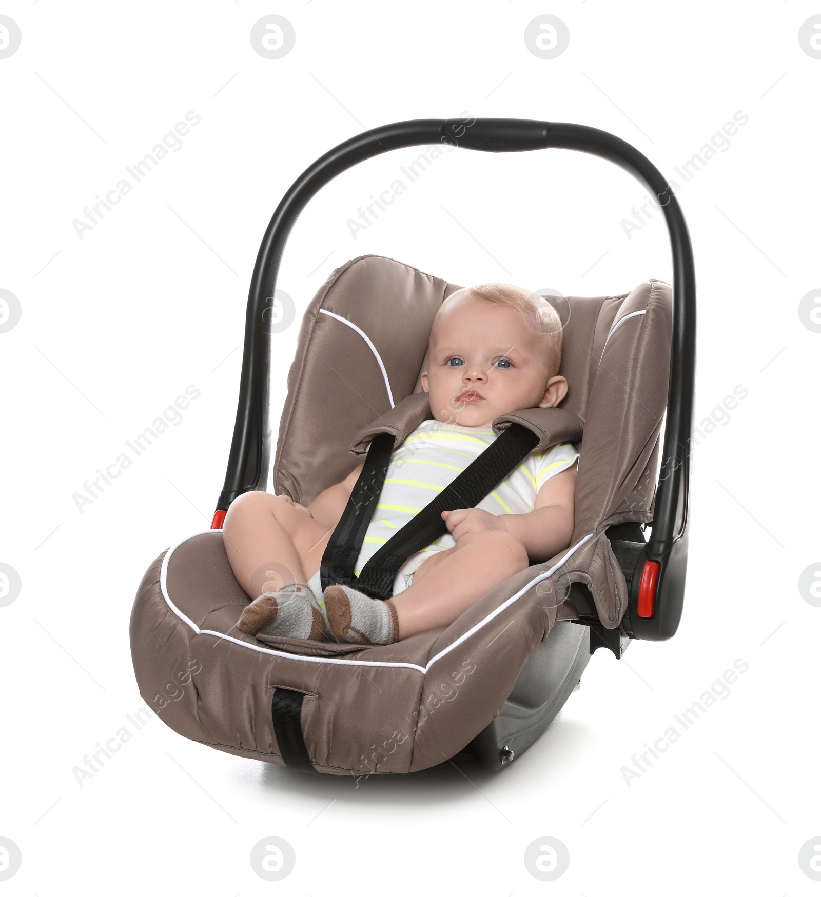 Photo of Adorable baby in child safety seat on white background