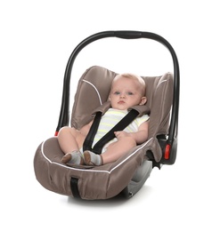 Photo of Adorable baby in child safety seat on white background