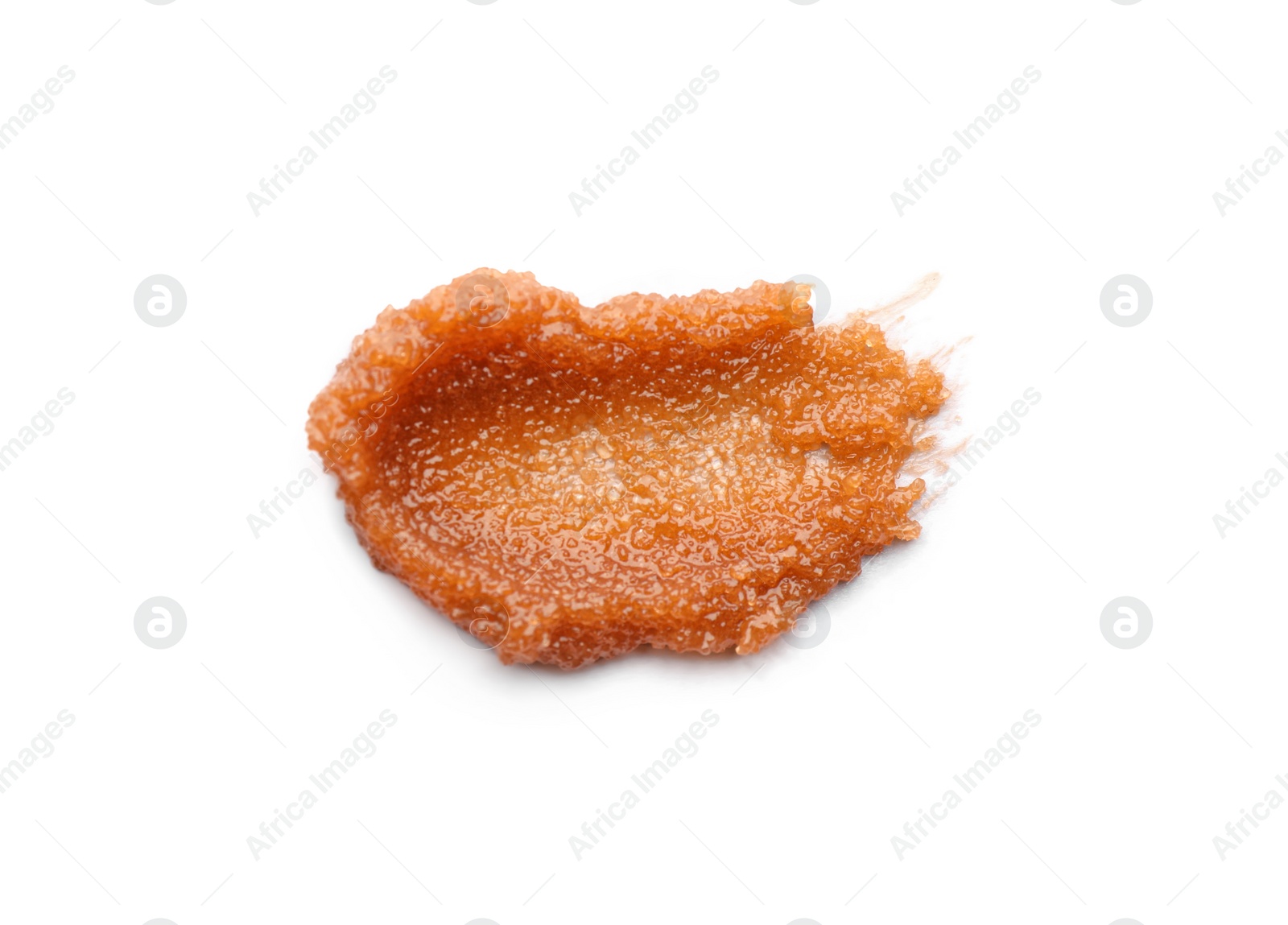 Photo of Smear of brown body scrub isolated on white, top view