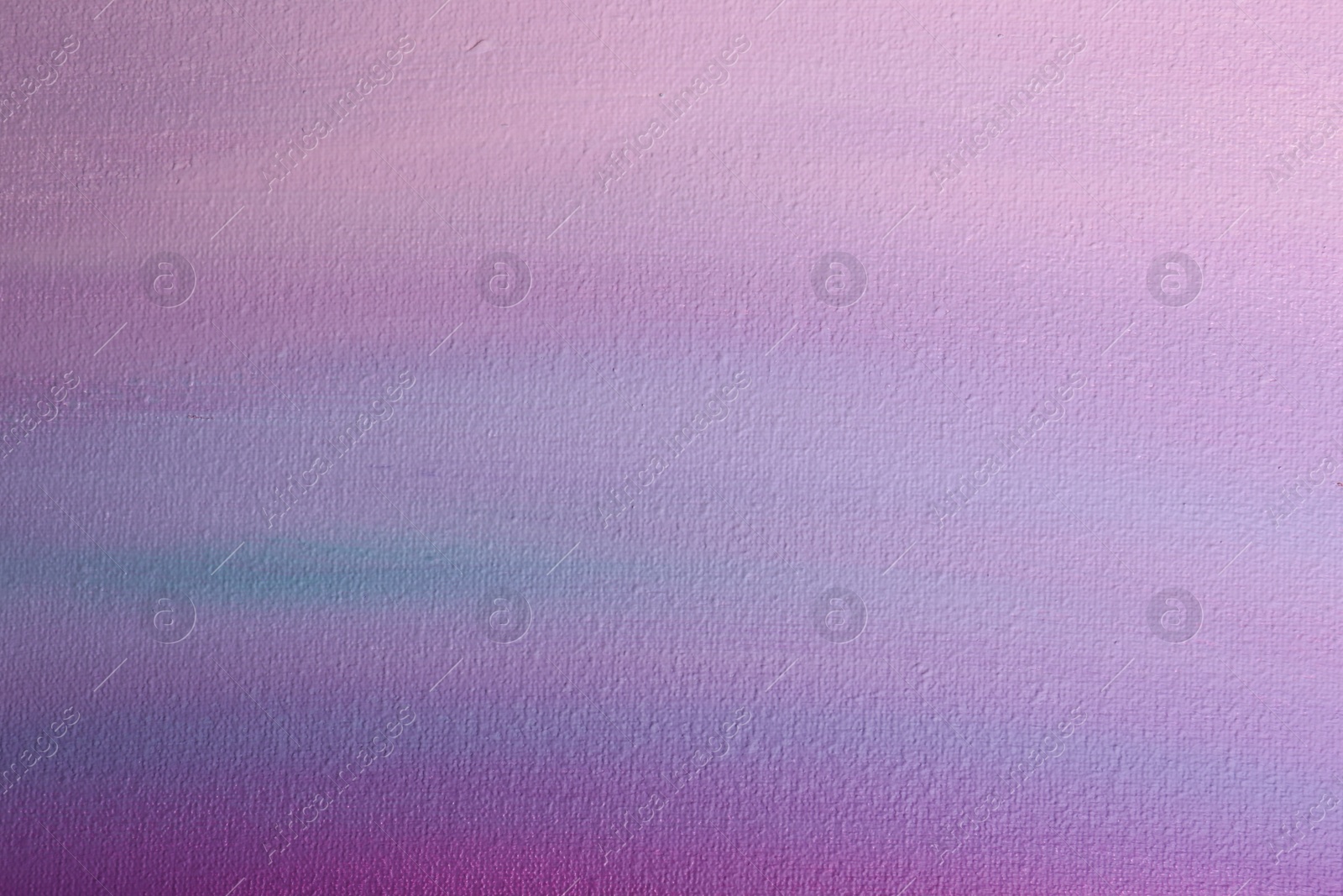 Photo of Canvas with colorful gradient painting, closeup view