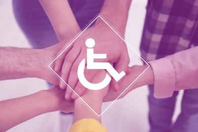 Image of Inclusion concept. International symbol of access. People holding hands together, closeup