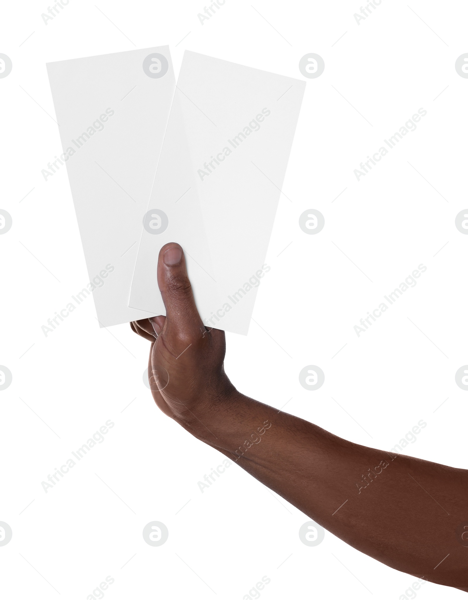 Photo of African American man holding flyers on white background, closeup. Mockup for design