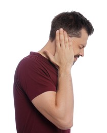 Man suffering from ear pain on white background