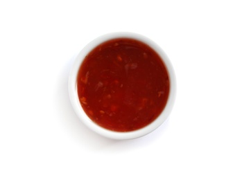 Photo of Delicious tomato sauce in bowl on white background, top view