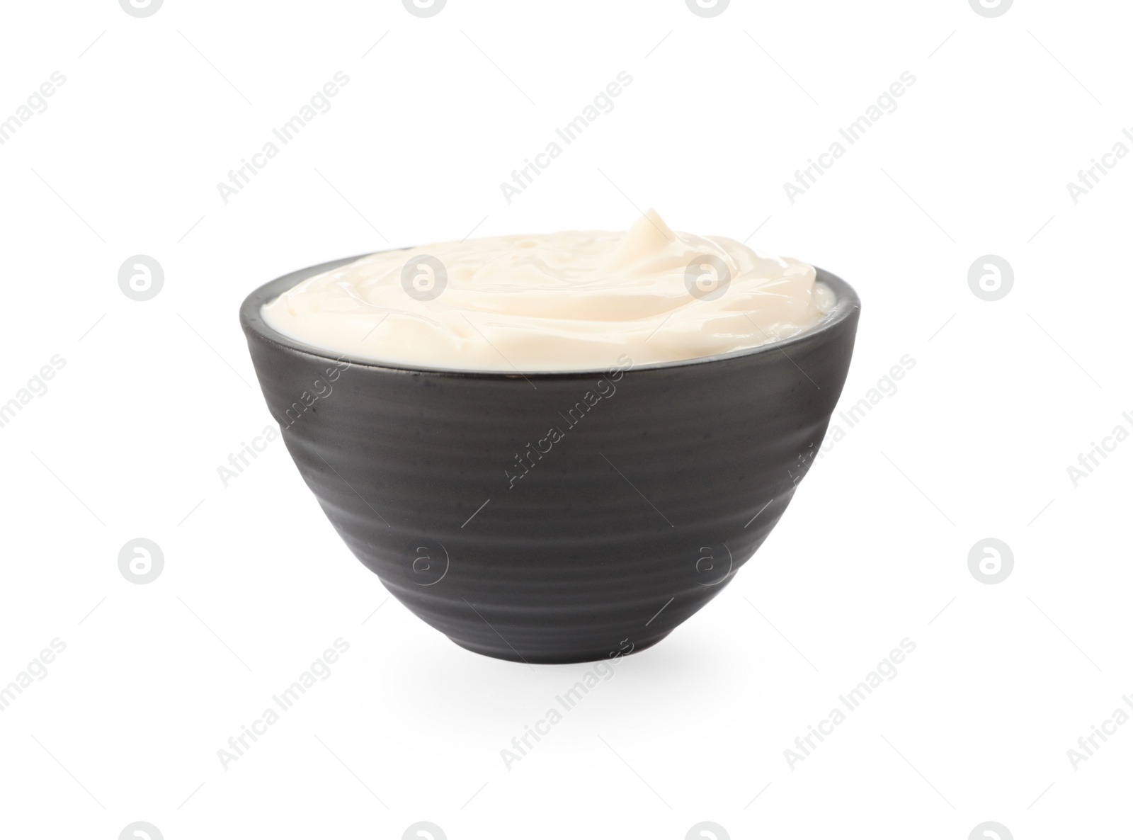 Photo of Bowl with tasty mayonnaise isolated on white