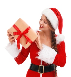 Beautiful Santa girl with Christmas gift on white background