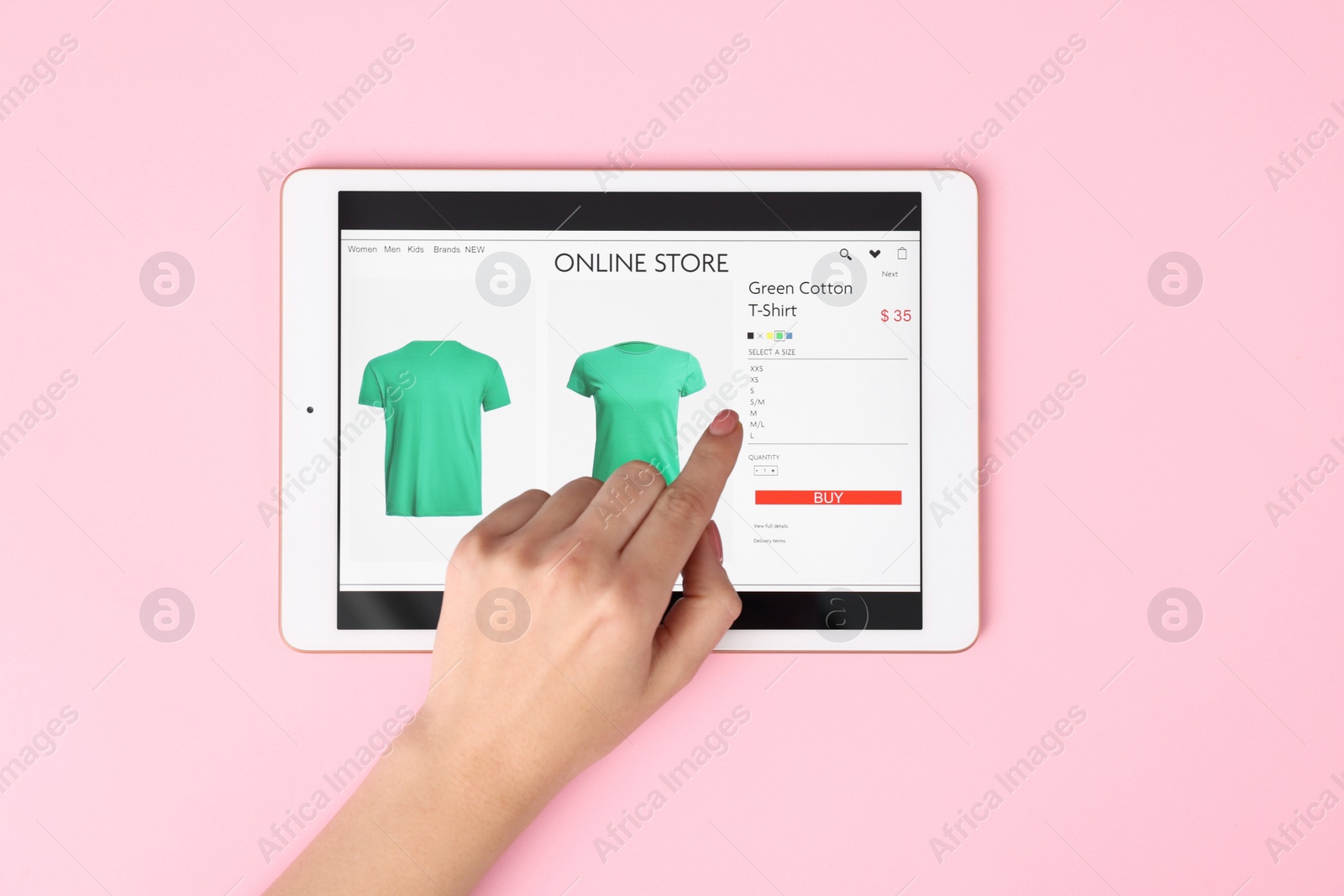 Photo of Woman with tablet shopping online on pink background, top view