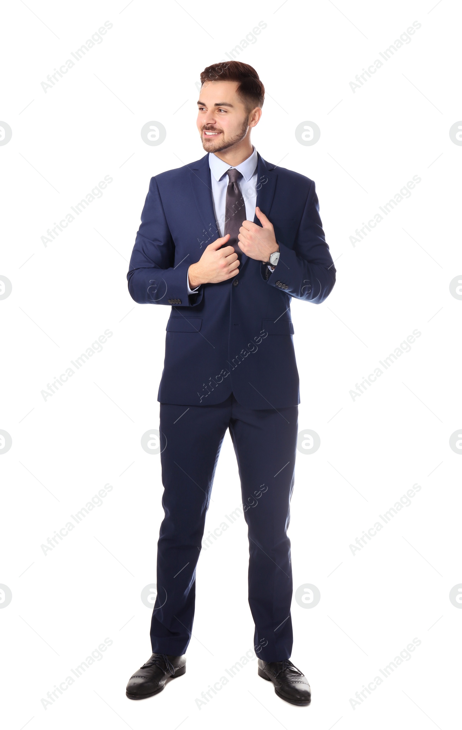 Photo of Full length portrait of businessman posing on white background