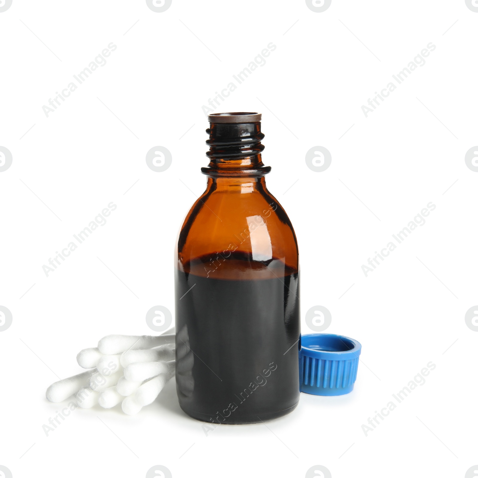 Photo of Bottle of medical iodine and cotton buds on white background