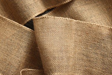 Photo of Texture of burlap fabric as background, top view