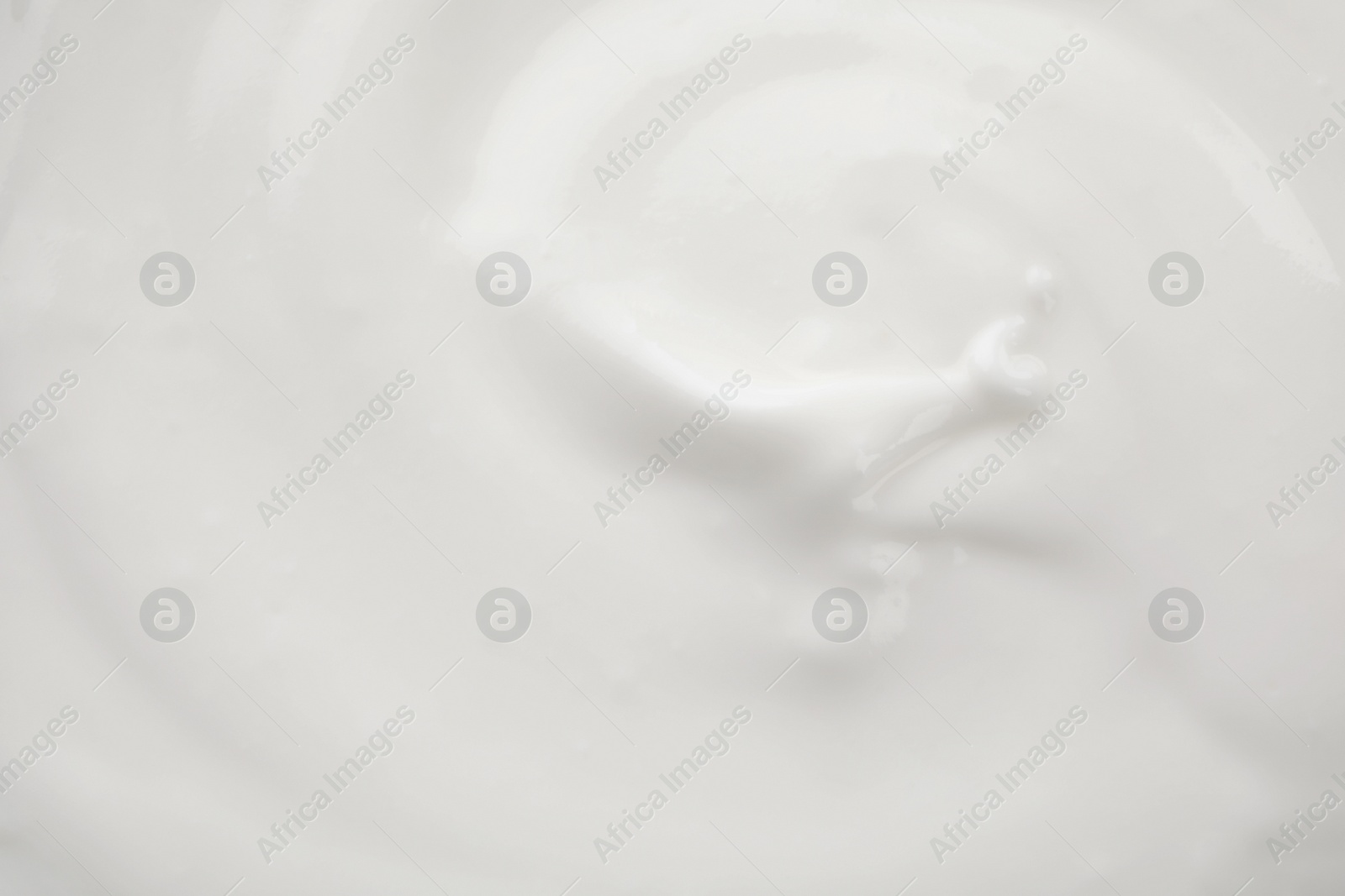 Photo of Delicious creamy yogurt as background, closeup view