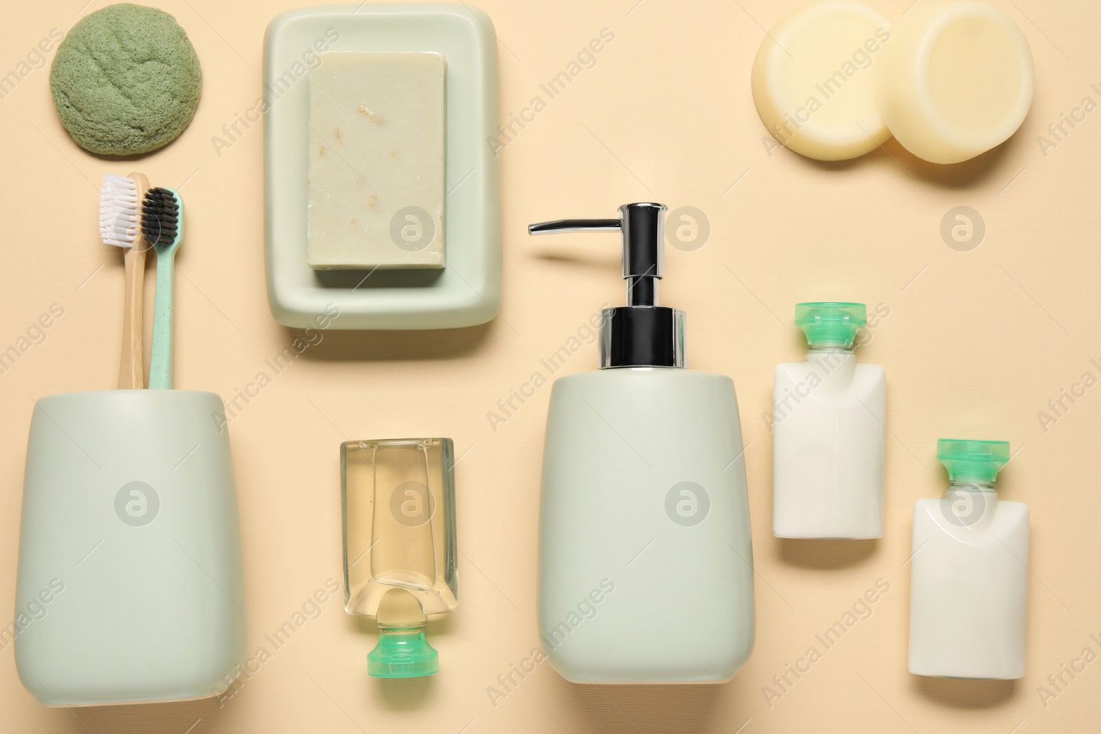 Photo of Bath accessories. Flat lay composition with personal care products on beige background