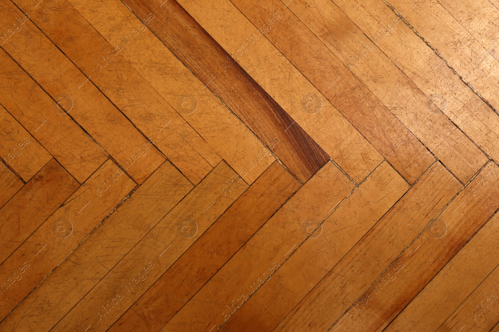 Photo of Wooden parquet floor as background, top view