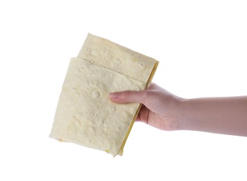 Photo of Woman holding thin Armenian lavash on white background, closeup