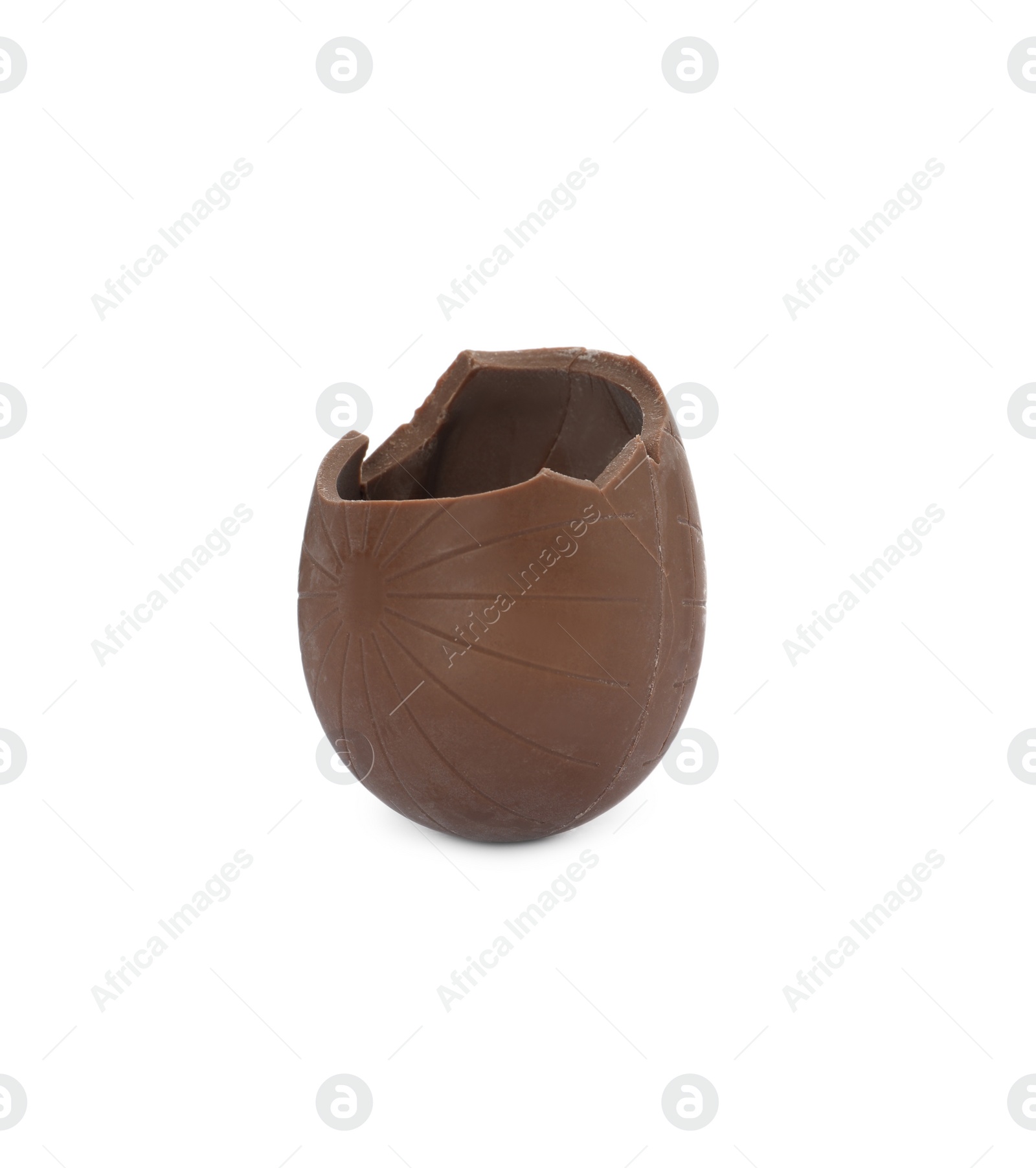 Photo of Broken milk chocolate egg on white background