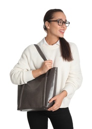 Woman with stylish shopper bag on white background
