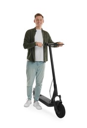 Photo of Happy man with modern electric kick scooter on white background