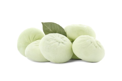 Photo of Raw dumplings with bay leaf on white background