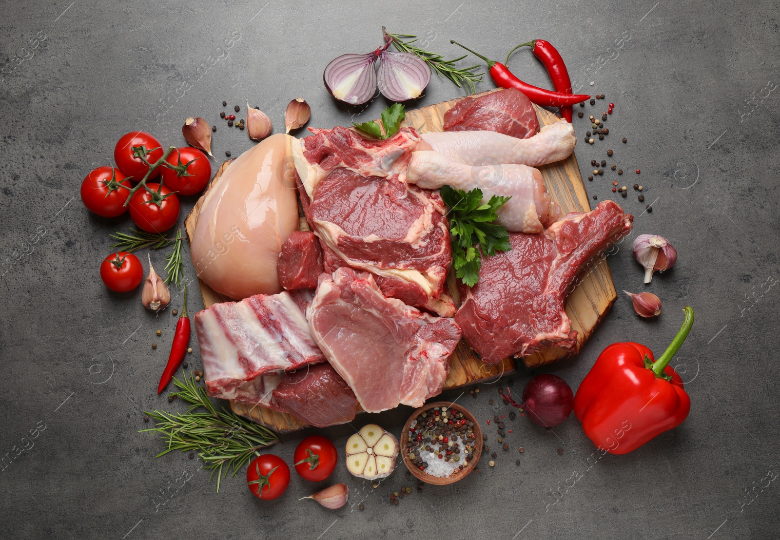 Image of Flat lay composition with fresh meat on grey table 