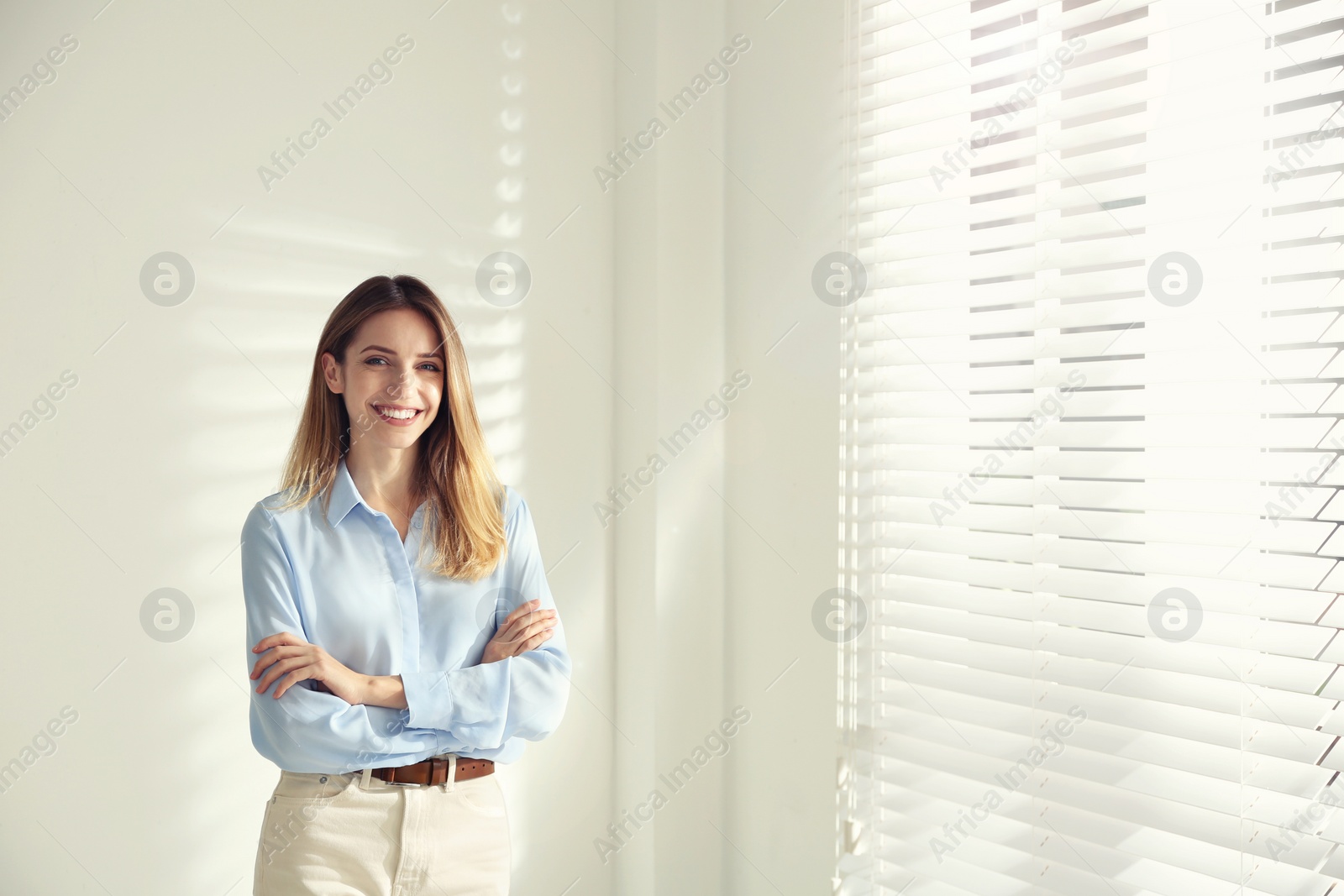 Photo of Portrait of beautiful young businesswoman in office