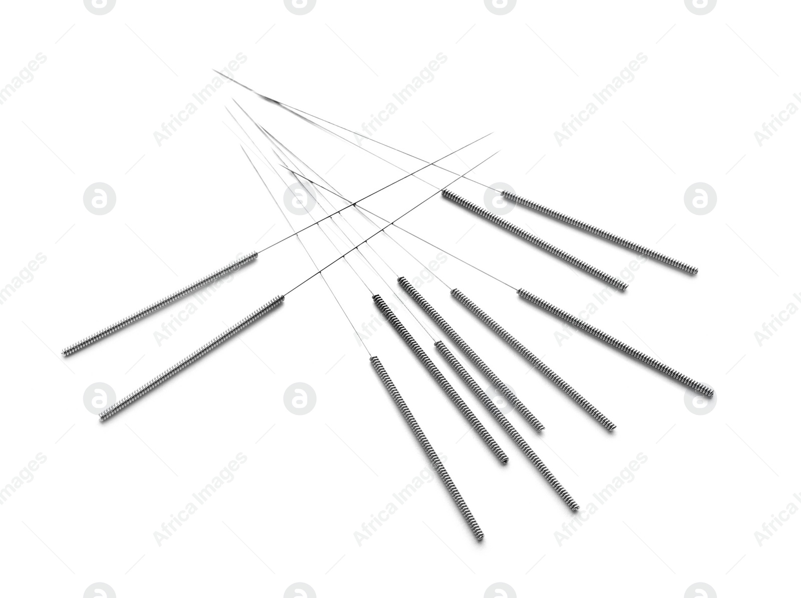 Photo of Needles for acupuncture on white background