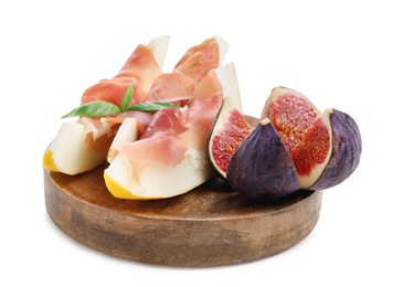Photo of Wooden board with tasty melon, jamon and figs isolated on white