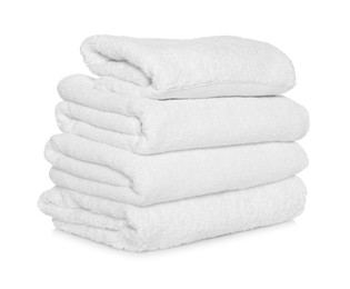 Folded soft terry towels on white background