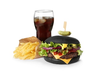 Black burger, French fries and glass of cola isolated on white