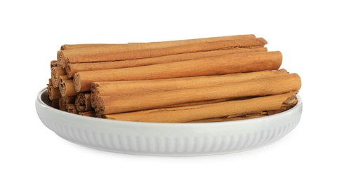 Aromatic dry cinnamon sticks on white background