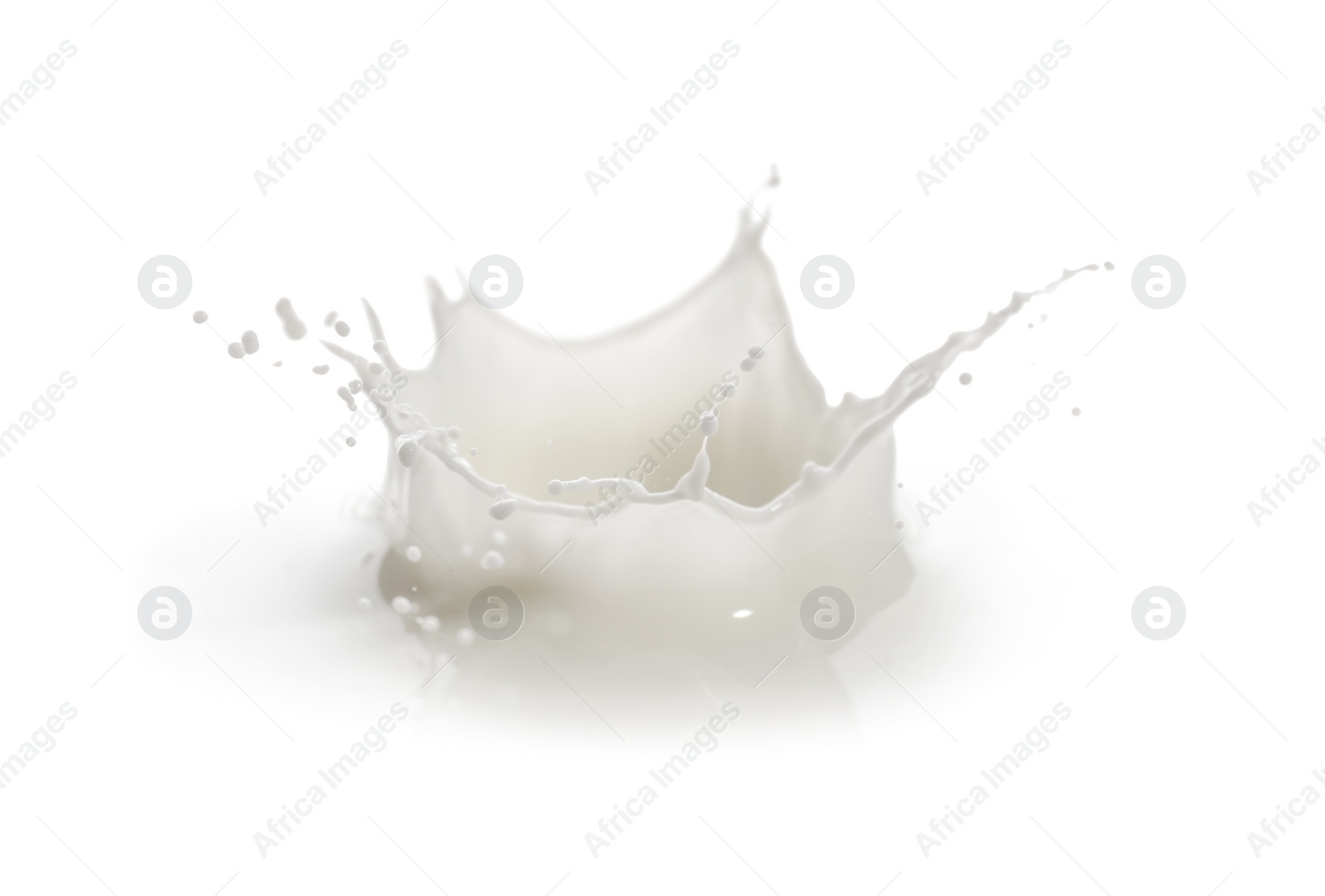 Photo of Splash of fresh milk isolated on white