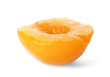 Photo of Half of canned peach on white background