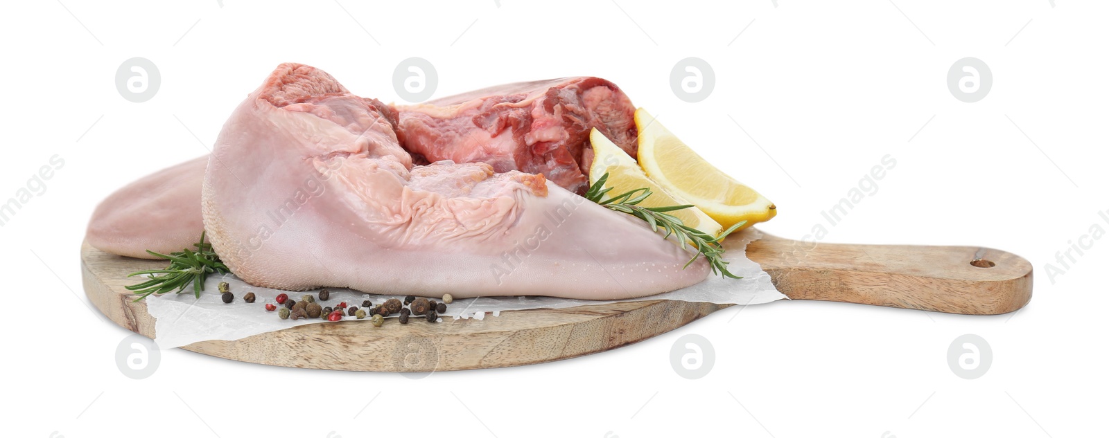 Photo of Raw beef tongues, peppercorns, salt, rosemary and lemon isolated on white