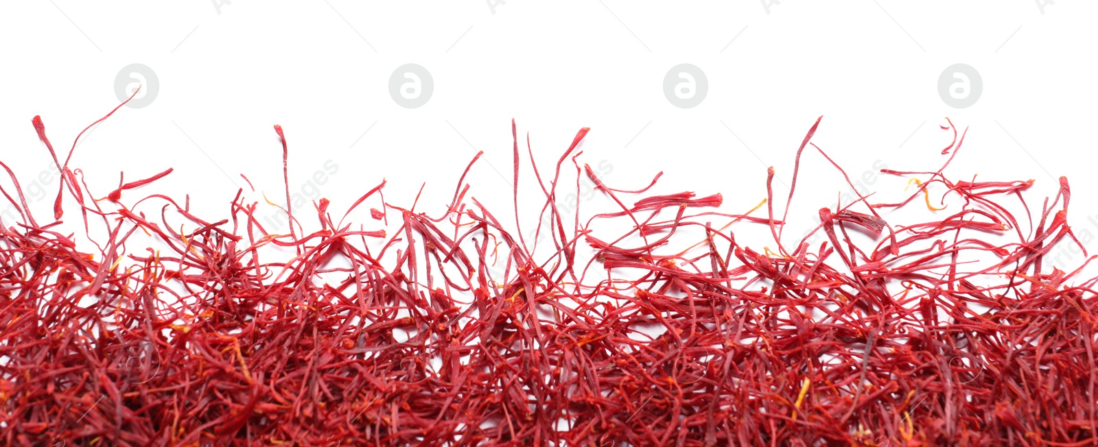 Photo of Dried saffron on white background, top view