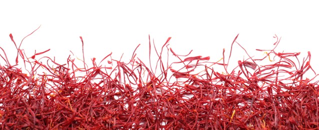 Dried saffron on white background, top view