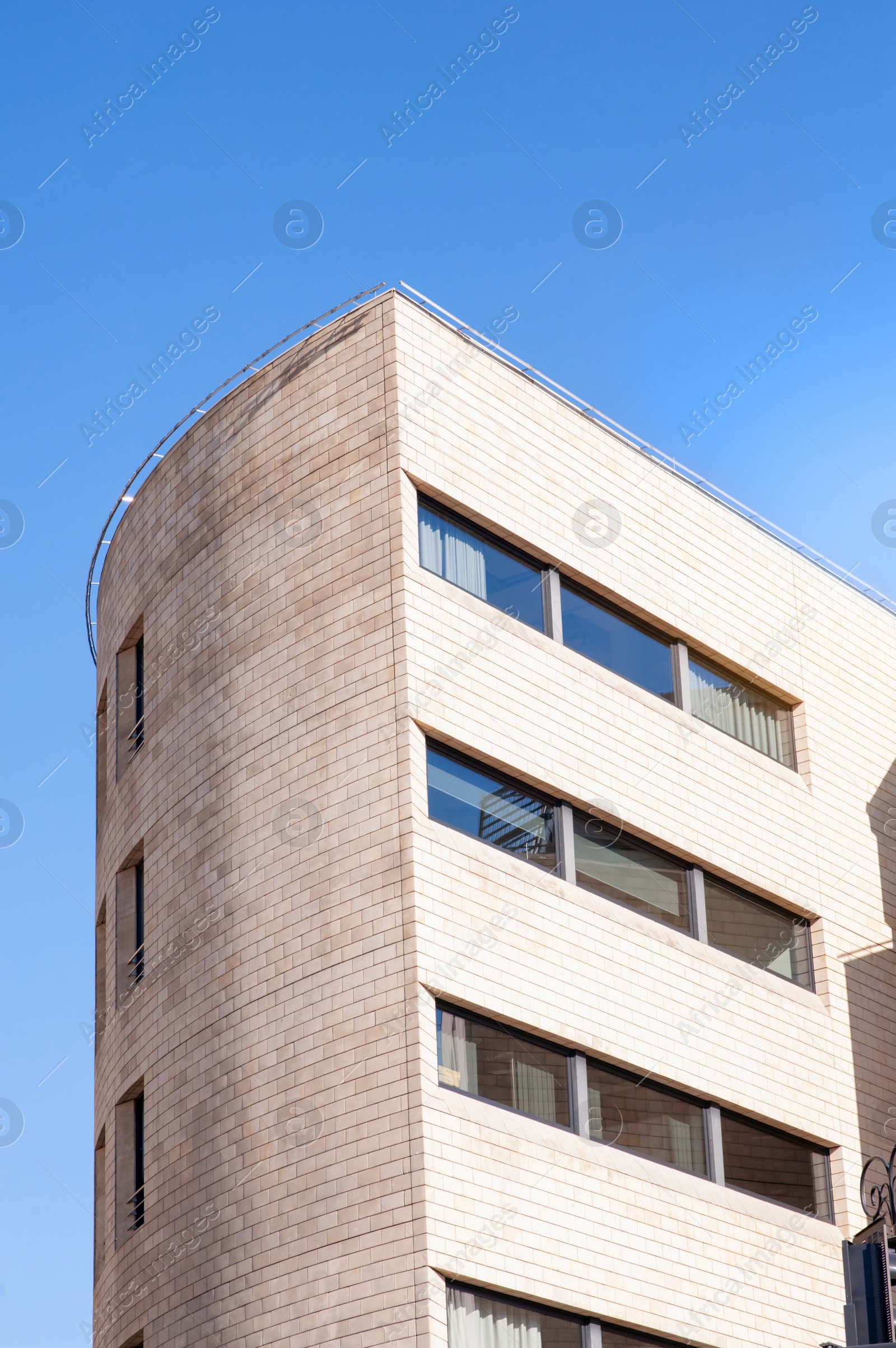 Photo of Beautiful view of modern building on sunny day