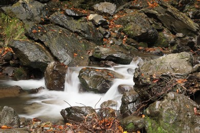 Photo of Beautiful view of mountain stream and rocks outdoors