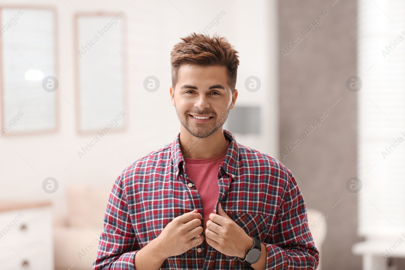 Photo of Portrait of handsome young man in room