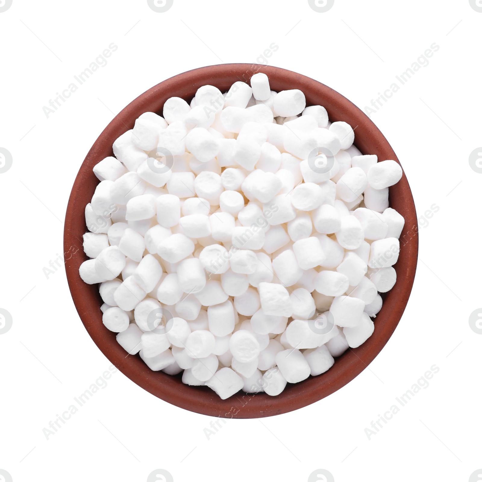 Photo of Bowl of delicious puffy marshmallows isolated on white, top view